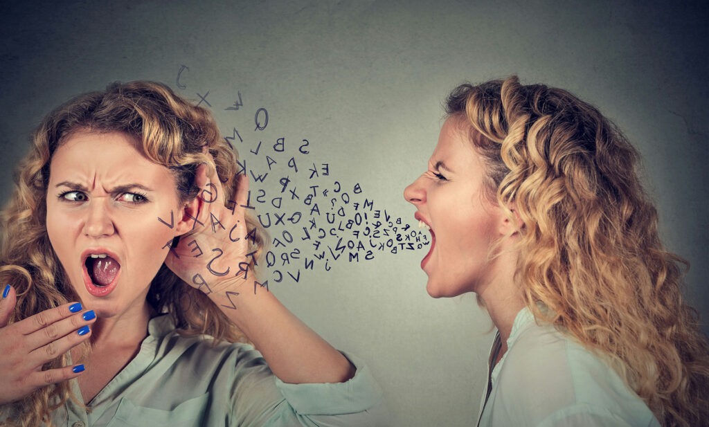 Woman expressing anger and frustration while illustrating the importance of anger management in addiction recovery