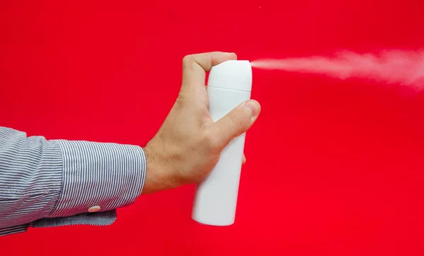 Household aerosol spray representing the risks of huffing inhalants