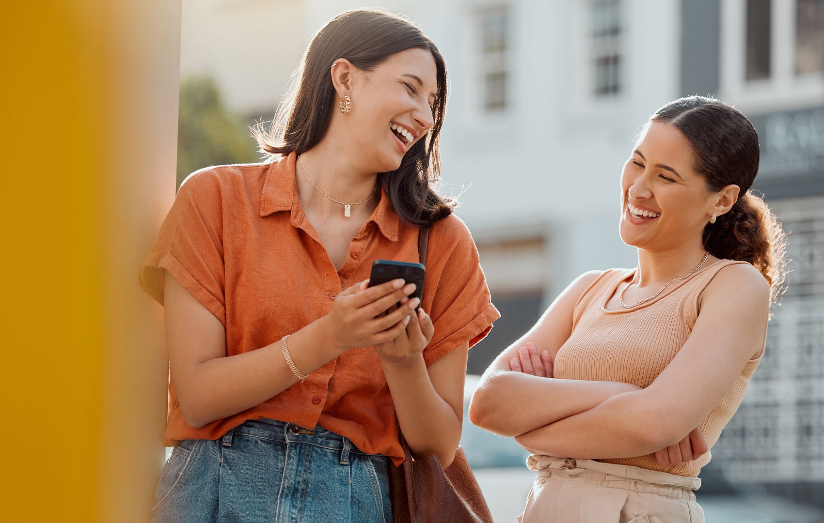 Women happy about the Unicare insurance coverage benefits